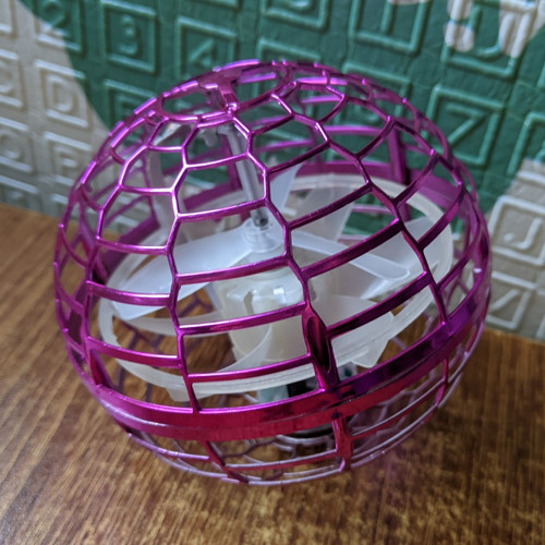 Pink caged flying ball - caged,